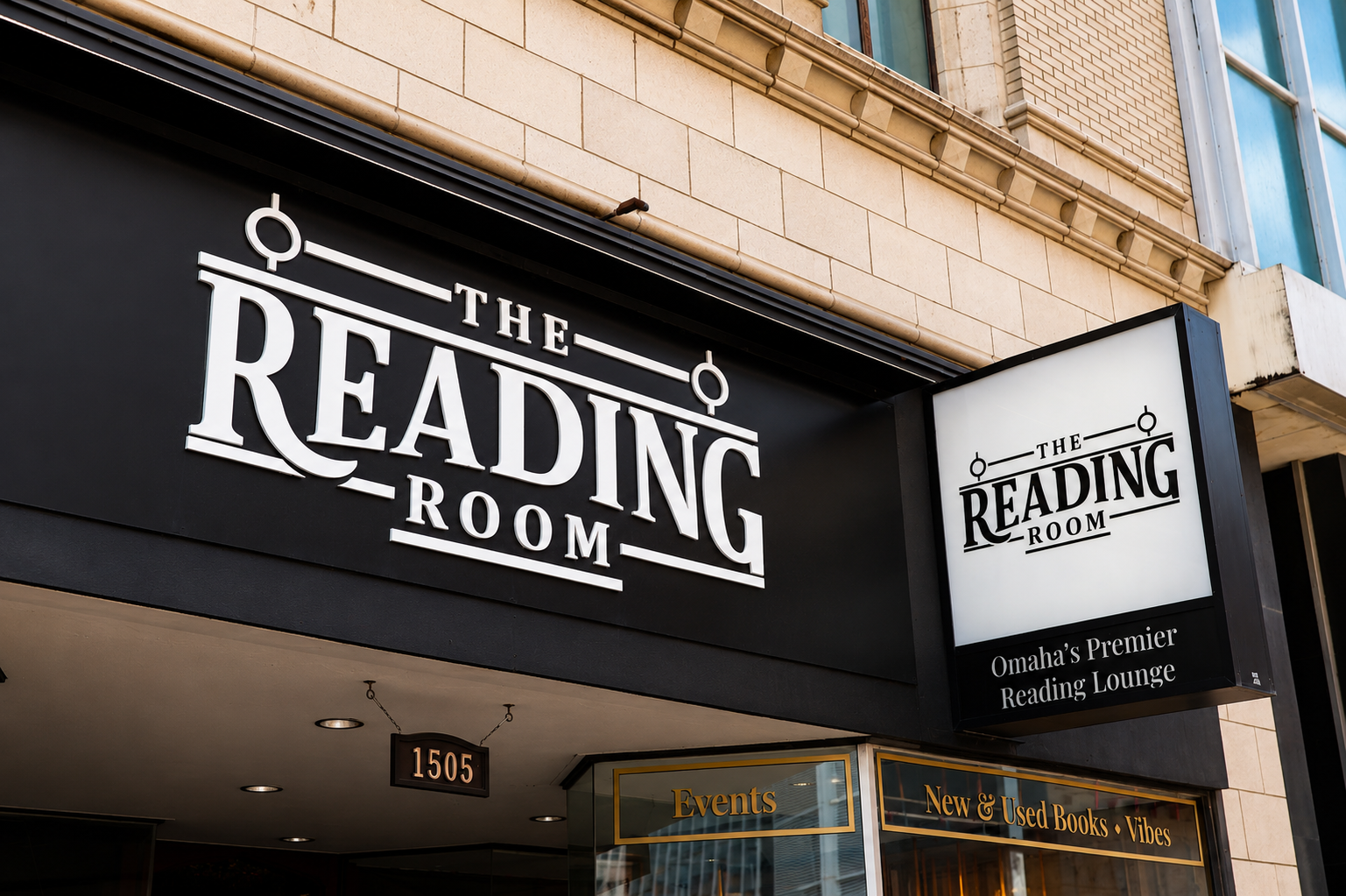 Exterior signage for The Reading Room at 1505 Farnam Street in downtown Omaha, Nebraska